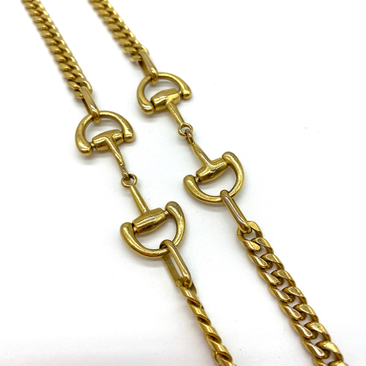 A Snaffle Horse Bit Gold Tone Curb Chain Necklace