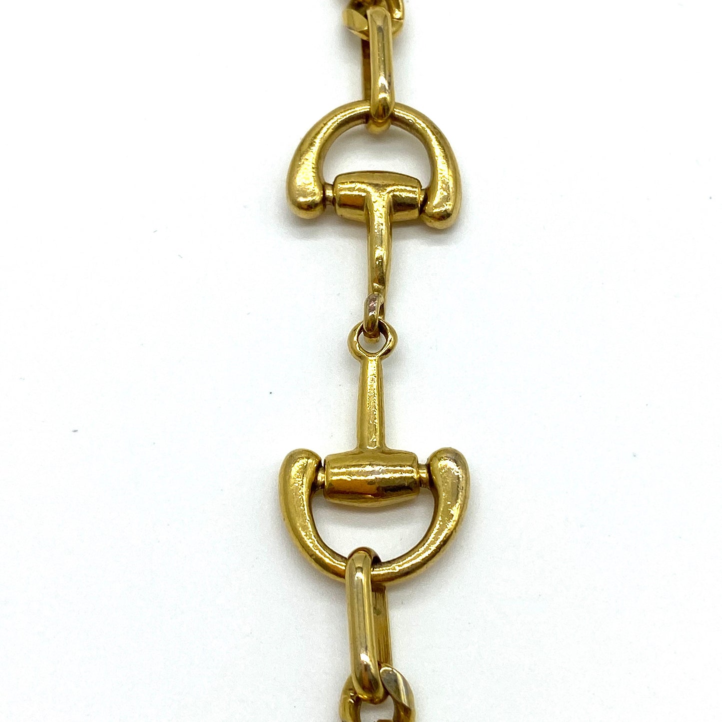 A Snaffle Horse Bit Gold Tone Curb Chain Necklace