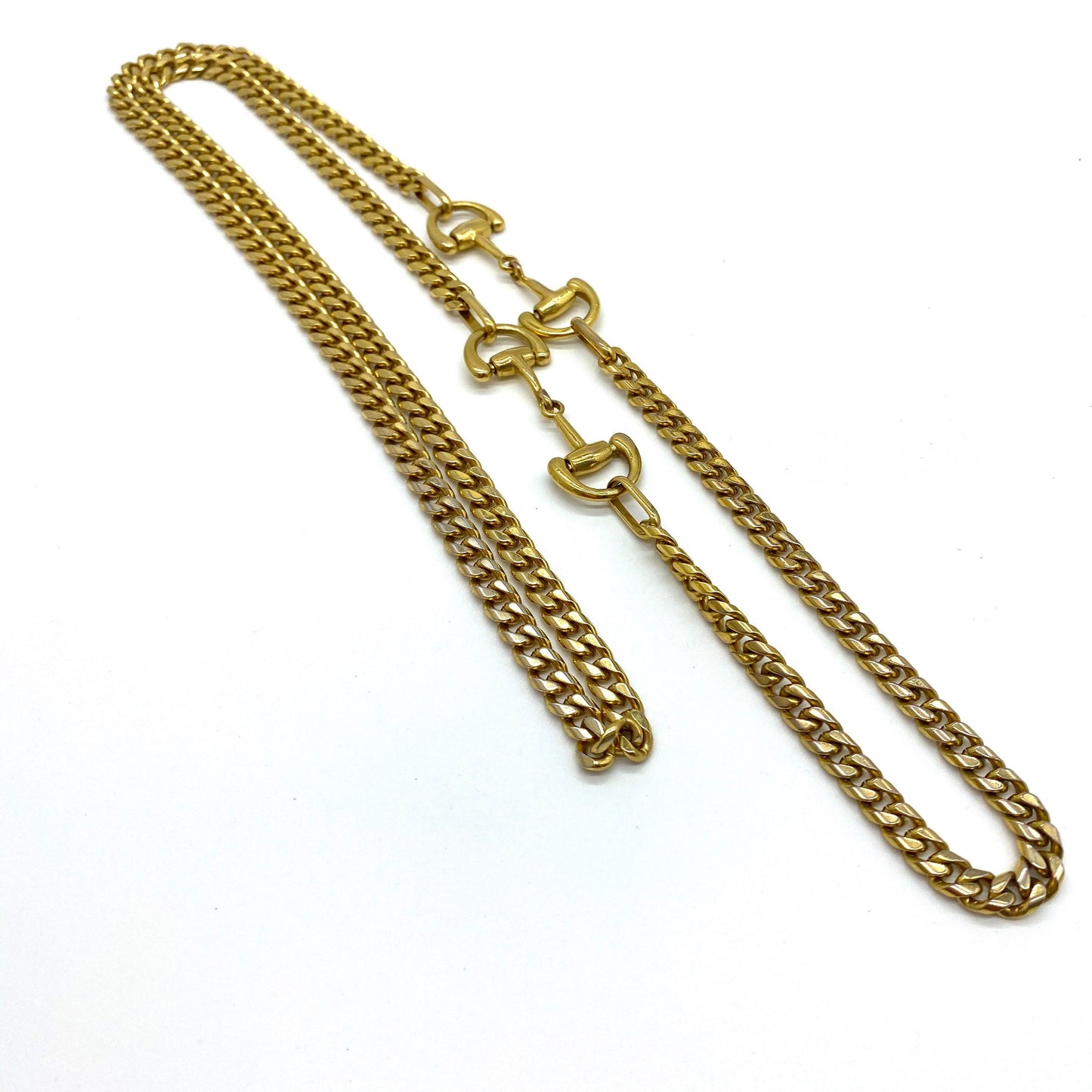 A Snaffle Horse Bit Gold Tone Curb Chain Necklace