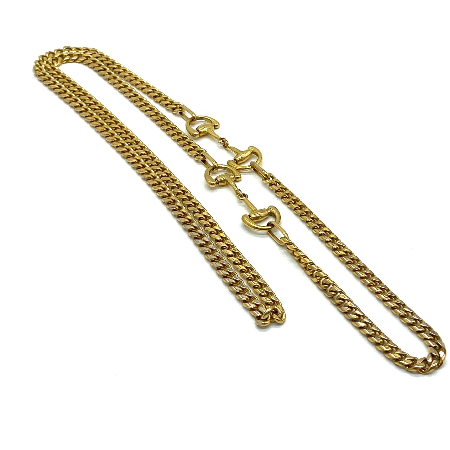 A Snaffle Horse Bit Gold Tone Curb Chain Necklace