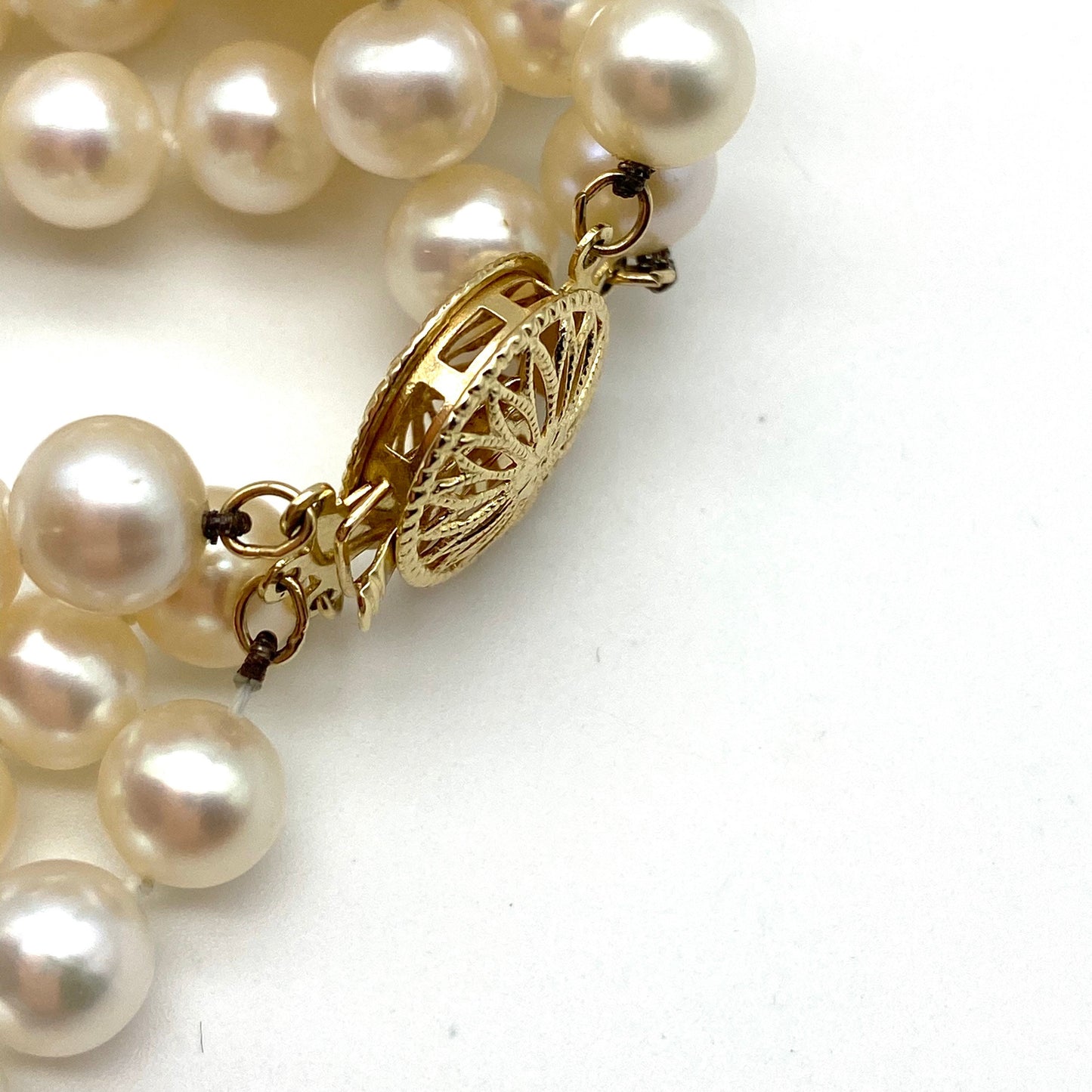 14ct Gold Cultured Freshwater Pearl Three Strand Necklace with decorative 14ct Gold Filigree Clasp with Private Valuation Dated July 2020