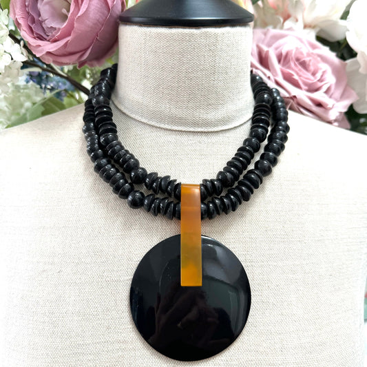 Black and Orange Resin Two Strand Bead Necklace with Integral Disc Pendant