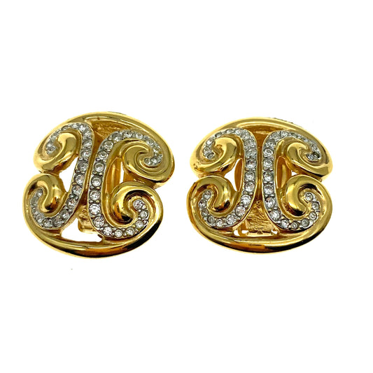 Boucles d'oreilles à clip en cristal à volutes signées « a »