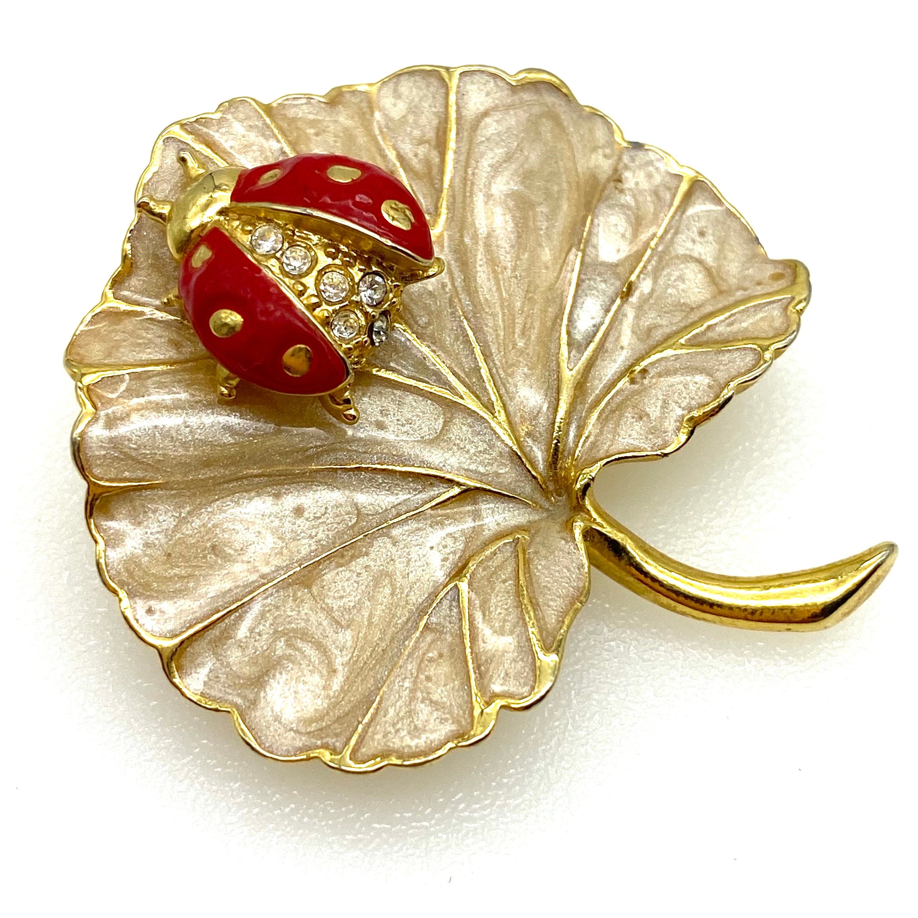 Avon (signed S©P on reverse) popular duet ladybird pin/leaf brooch